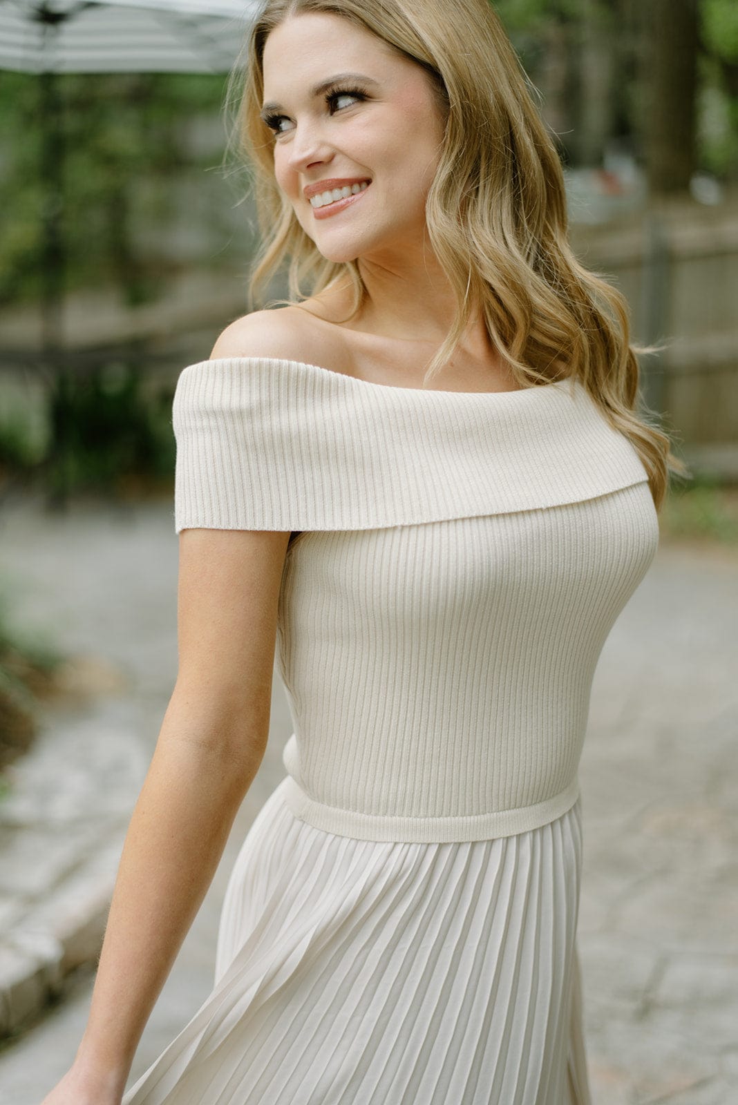 Beige pleated midi dress with off the shoulder design