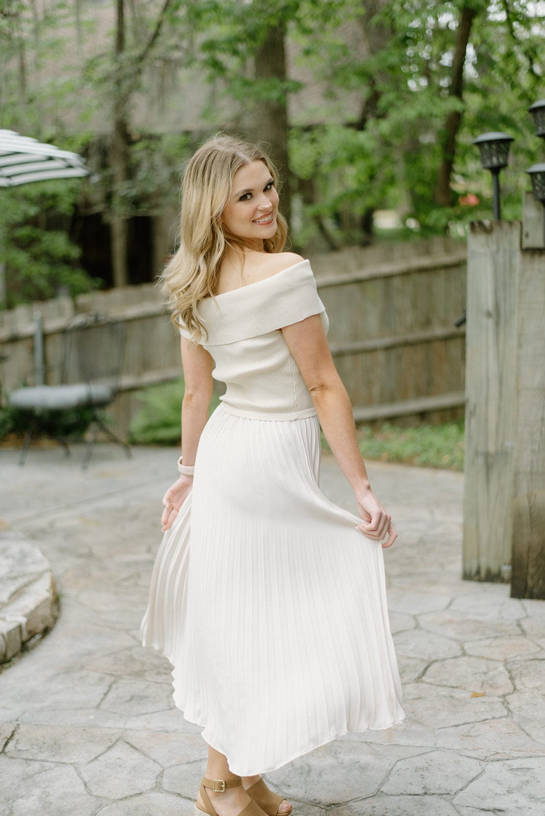 Beige pleated midi dress with off the shoulder design