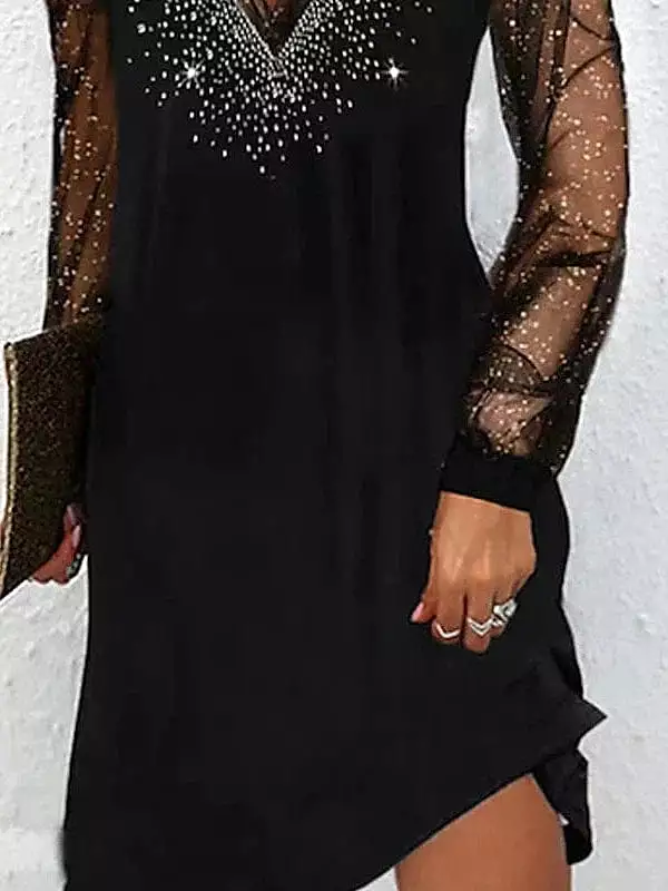 Elegant women's black shift dress - long sleeves, midi length.